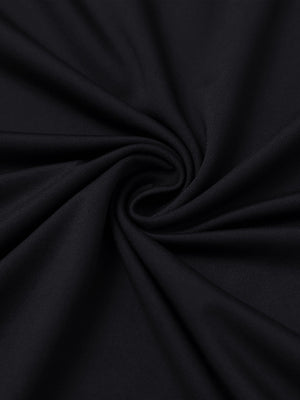 Close-up of fabric on everyday jersey henley shirt, soft knit texture with relaxed black tone