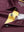 Detail shot of the collar on the burgundy geometric 4 way stretch print collared polo shirt, emphasizing the classic neckline design
