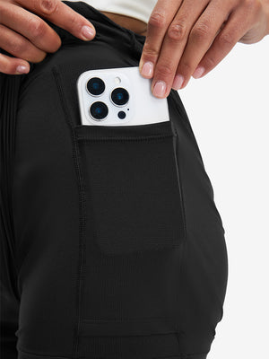 Inside view of pocket on black women's high waist 2 in 1 quick dry shorts with 7 pockets
