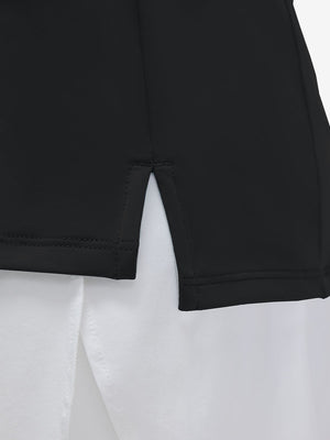 Detail view of hem on black women's 4 buttons golf polo shirts