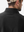 Close-up view of the logo on the back of the black heather pullover