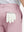 Detail view of back pocket on pink stretch cotton blend slim fit golf trousers 5 pockets