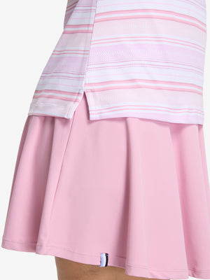 Detail view of hem on pink purple stripes women's sleeveless q-zip print quick dry golf tops