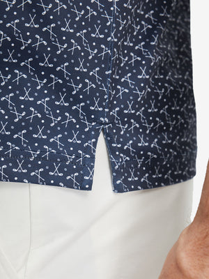 Detail view of hem on dark blue golf premium ribbed collar print polo shirts