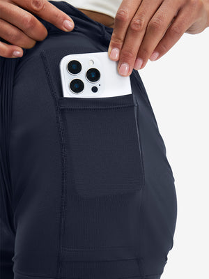 Inside view of pocket on navy women's high waist 2 in 1 quick dry shorts with 7 pockets