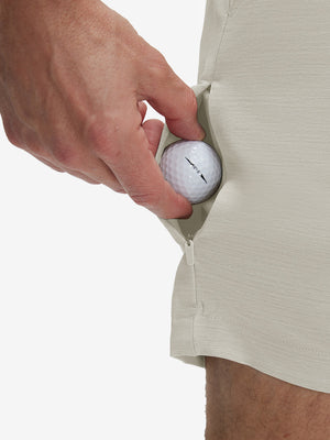 Detail view of stretch fabric on fossil flat front hybrid golf shorts