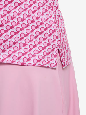 Detail view of hem on white pink geometric women's sleeveless q-zip print quick dry golf tops