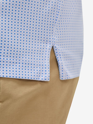 Detail view of hem on pink small fish premium ribbed collar print polo shirts