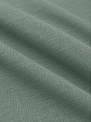 Close-up shot of soft heather knit fabric and fine textile texture, heather midlayer golf hoodies in celadon green heather