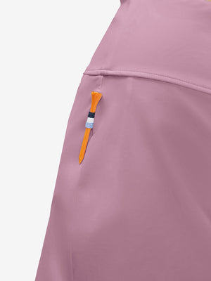 Side detail of lavender pink high waist built-in short a-line golf skirt with 5 pockets