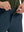 Detail view of the zipper on the navy stretch soft flat front dress golf shorts, highlighting secure closure