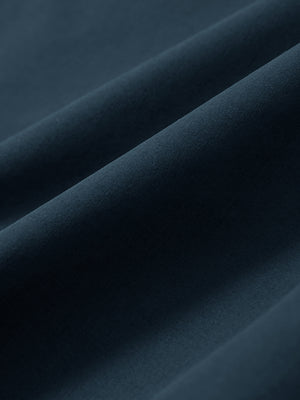 Close-up of navy stretch quick dry casual golf pants with 4 pockets fabric texture.