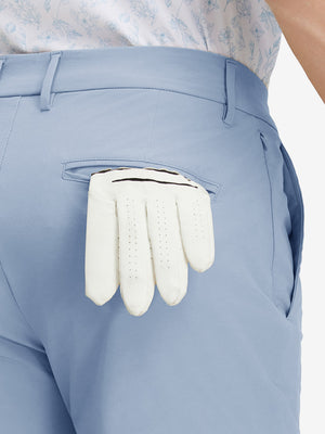 Detail view of back pocket on sky blue stretch cotton blend slim fit golf trousers 5 pockets