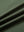 Close-up of olive green ventilated pique performance polo fabric showing breathable texture.