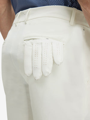 Detail view of back pocket on white flat front flex cotton blend golf shorts