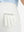 Detail view of back pocket on white stretch cotton blend slim fit golf trousers 5 pockets
