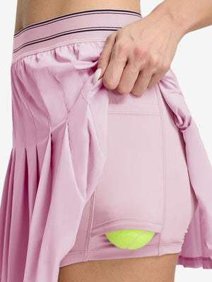 Detail view of inner pocket on light pink women's moisture-wicking athletic tennis skirts
