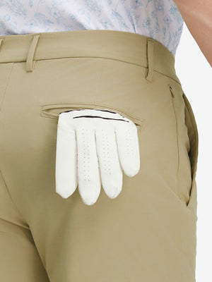 Detail view of back pocket on khaki stretch cotton blend slim fit golf trousers 5 pockets