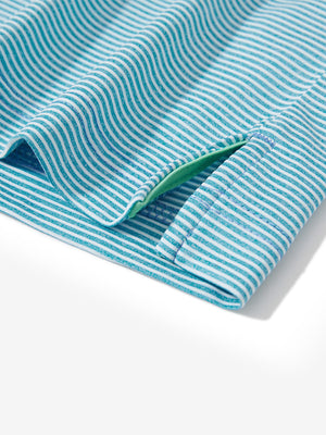 Detail view of hem on blue white comfy breathable pin-stripe texture golf polos
