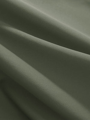 Close-up texture of mossy stone women's athletic quarter zip tank tops fabric showing detailed athletic material and weave.