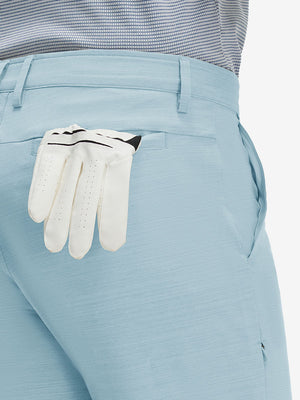 Detail view of back pocket on light blue straight fit lightweight dress golf pants
