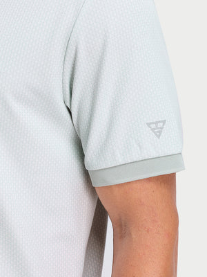 Detail view of cuff on light grey moisture wicking jacquard golf shirts