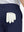 Detail view of back pocket on dark blue stretch cotton blend slim fit golf trousers 5 pockets