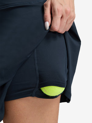 Detail view of inner pocket on navy blue women's high waisted golf skirts with 4 inner pockets