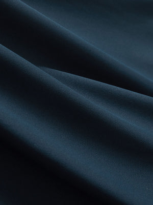 Close-up texture of navy cool print plain button up shirts fabric showing detailed print and weave.