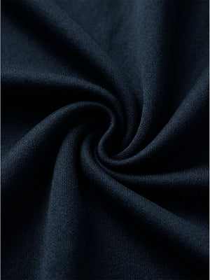 Macro shot of smooth lightweight fabric texture with fine weave details, women's lightweight golf dress with 2 pockets in navy