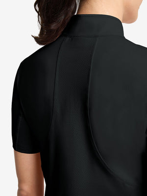 Detail view of back design on black women's breathable 1/4 zip pullover golf shirts