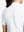 Detail view of back design on white women's breathable 1/4 zip pullover golf shirts