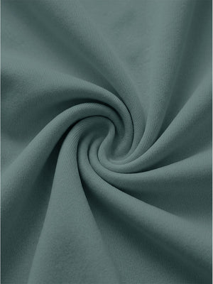 Macro shot of smooth lightweight fabric texture with fine weave details, women's lightweight golf dress with 2 pockets in dusty blue
