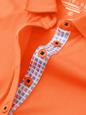 Detail view of collar and buttons on orange women's 5 buttons collared polo shirts