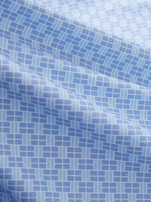 Close-up texture of blue plaid women's sleeveless q-zip print quick dry golf tops fabric showing detailed print and quick dry weave.
