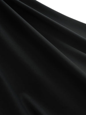 Close-up texture of black women's moisture-wicking mock neck sleeveless golf tops fabric showing breathable weave detail.