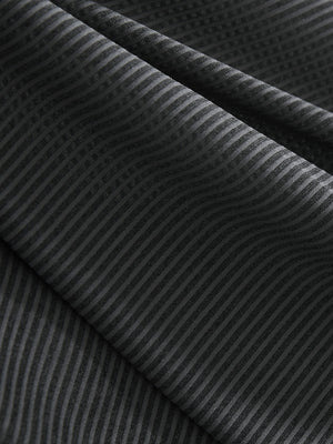 Close-up texture of light and dark grey comfy breathable pin-stripe texture golf polos fabric showing weave detail.