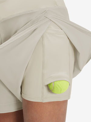Detail view of side inner pocket on oyster gray women's gym golf shorts with liner pocket