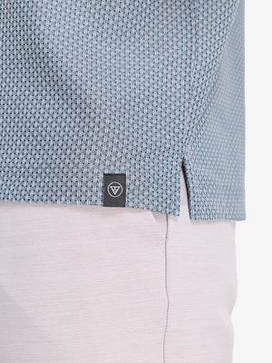 Detail view of cuff on misty blue moisture wicking jacquard golf shirts