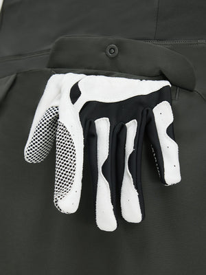 Detail view of pocket on dark grey women's stretch a-line golf skort with 7 pockets