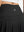 Detail view of back design on black women's high waisted golf skirts with 4 inner pockets