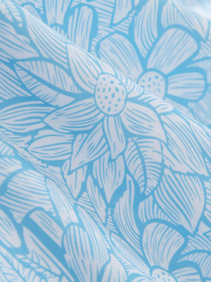 Close-up texture of blue antichoke premium ribbed collar print polo shirts fabric showing detailed premium material and weave.