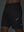 Detail of glow in the dark feature on black 4 way stretch breathable workout athletic shorts