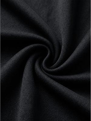 Macro shot of smooth lightweight fabric texture with fine weave details, women's lightweight golf dress with 2 pockets in black