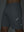 Detail of glow in the dark feature on dark grey 4 way stretch breathable workout athletic shorts