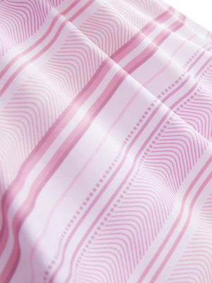 Close-up texture of pink purple stripes women's sleeveless q-zip print quick dry golf tops fabric showing detailed print and quick dry weave.