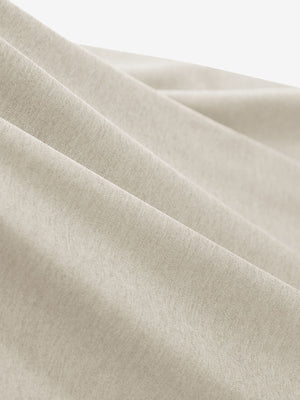  Close-up view of soft heather fabric texture and fine knitting craft, performance heather contrast collar polo shirts in light khaki heather