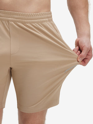 View showing loose fit of [color] 4 way stretch breathable workout athletic shorts