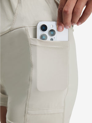 Detail view of inner pocket on oyster gray women's stretch a-line golf skort with 7 pockets