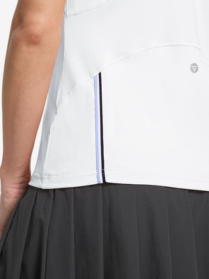 Detail view of hem design on white women's breathable 1/4 zip pullover golf shirts
